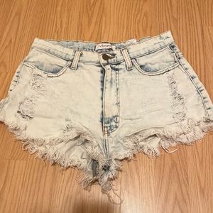 Mid rise distressed shorts